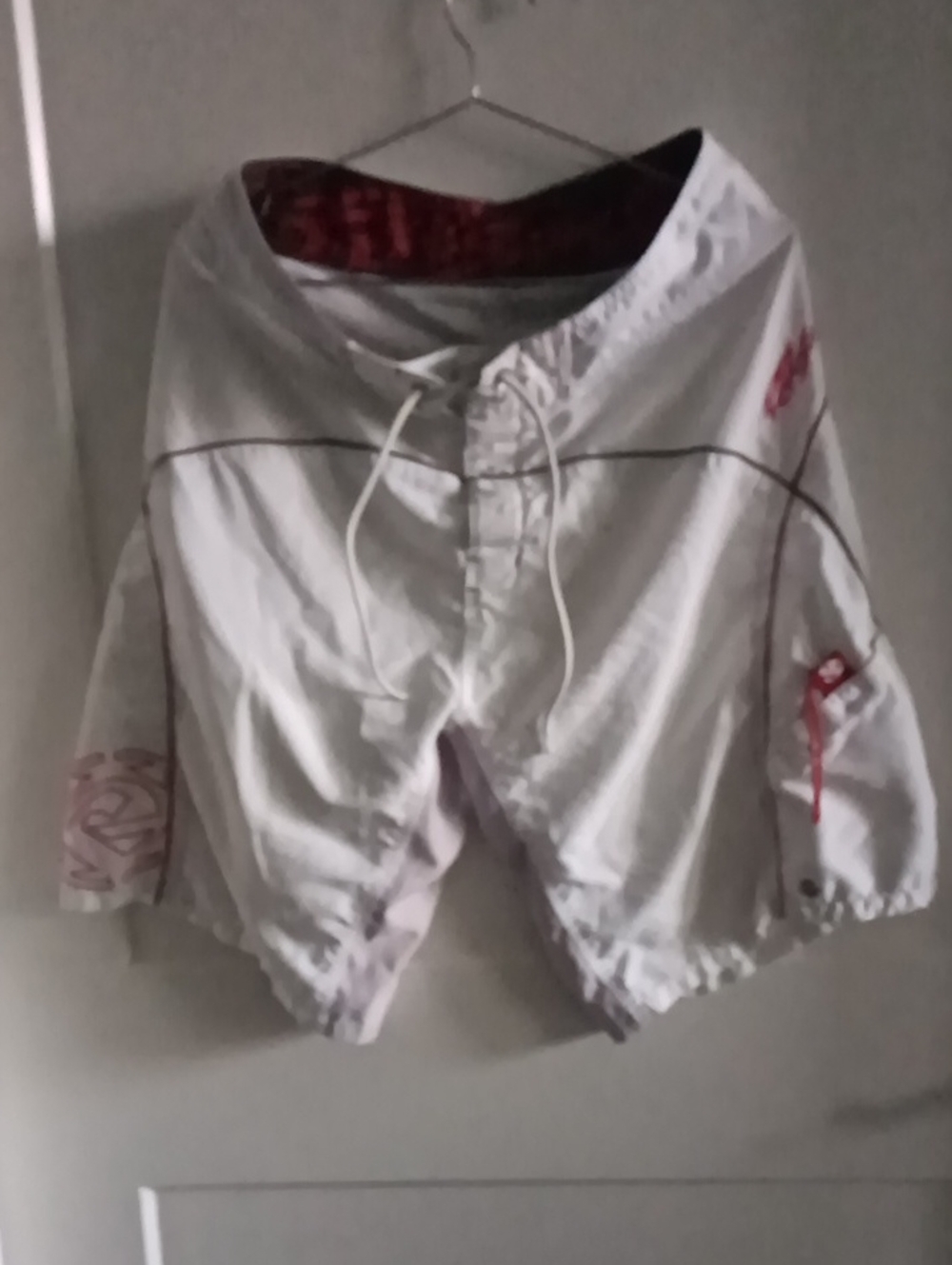 White Men's Board Shorts with Red Accents